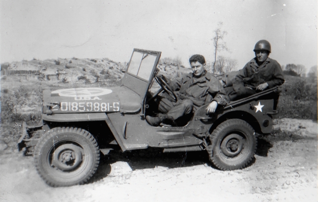Arty Burgess & Kenneth Figg in a Jeep. taken outside Bergen-op-Zoom, Holland April 1945 (In his own words "I look like a shady-looking character in this one)